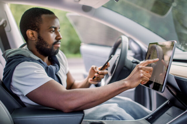 person in self-driving car