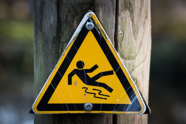 sign with man slipping