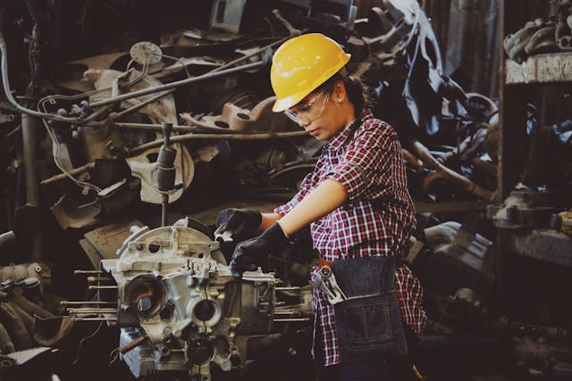 worker using machinery